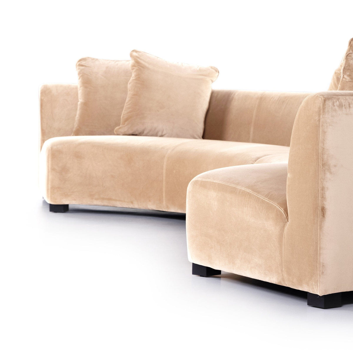 Camel colored curved sectional