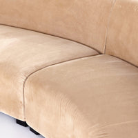 Camel colored curved sectional