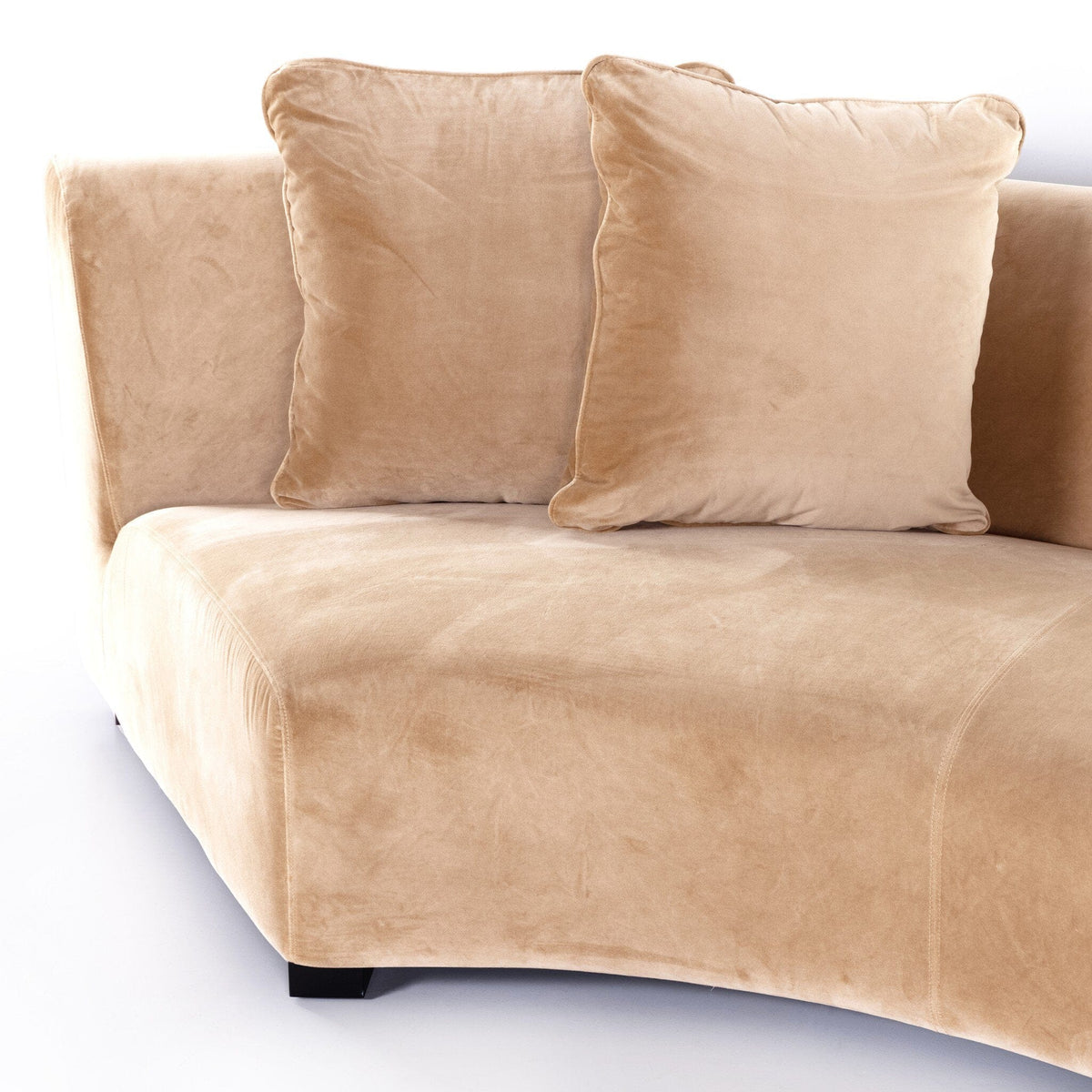 Camel colored curved sectional