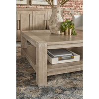 Adler square coffee table in natural gray distressed acacia veneer with a lower shelf.