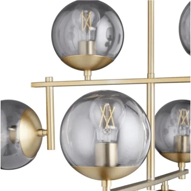Aiden Aged Brass Globe Chandelier with eight spherical glass lights and gilded linear frames.