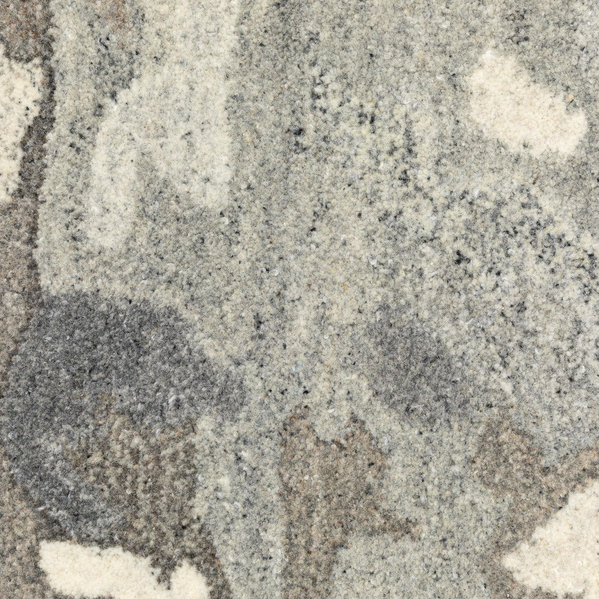 Close-up of Anastasia Grey & Charcoal contemporary hand-tufted wool rug with modernized traditional patterns.