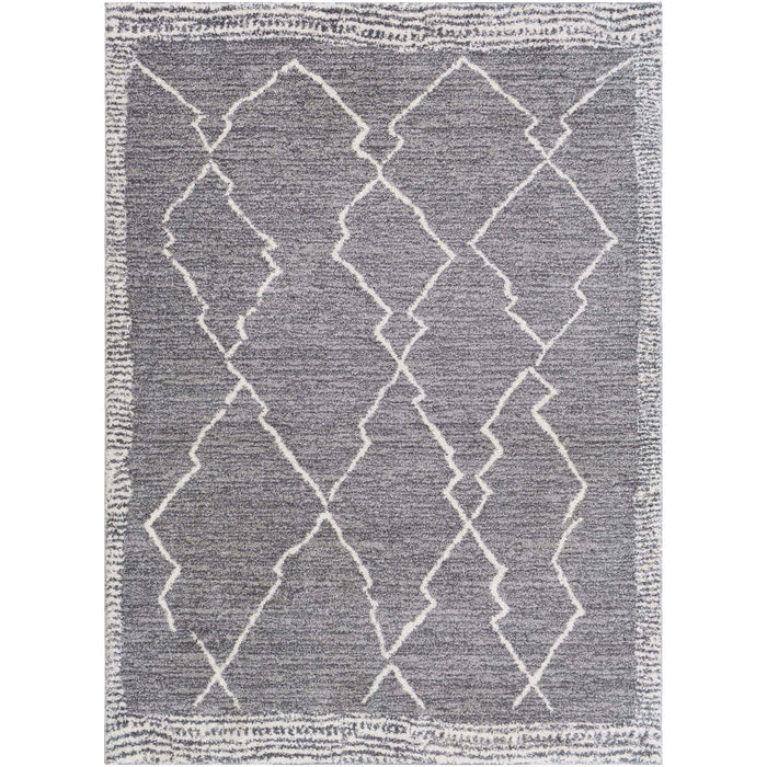 Andorra Charcoal & White polypropylene rug with a globally inspired geometric diamond pattern.