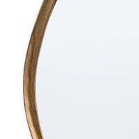 Close-up of Arbre Antique Gold Leaf Mirror's twisted, artisan frame with organic lines.