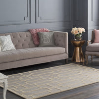 Arise Gray & Beige Hand Tufted Wool Rug with a modern geometric pattern, complementing a living room setting.