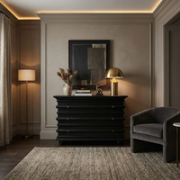 Hand-rubbed black mahogany Ascona 3-drawer chest with ribbed top, bun feet, and brass hardware.