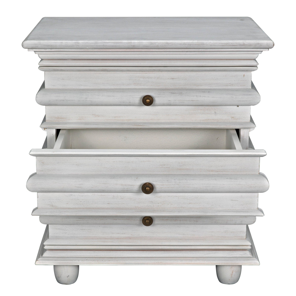 Ascona Side Table in white wash mahogany with brass pulls and three drawers, one partially open.