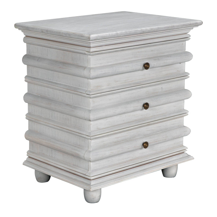Ascona Side Table in white wash mahogany with three drawers, brass pulls, and decorative curved fronts.