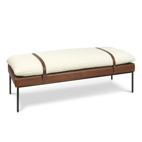 Aspen modern bench with a cream Boucle wool cushion strapped to a brown leather base on black metal legs.