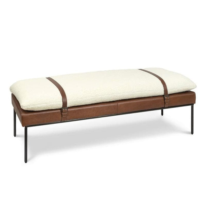 Aspen modern bench with a cream Boucle wool cushion strapped to a brown leather base on black metal legs.