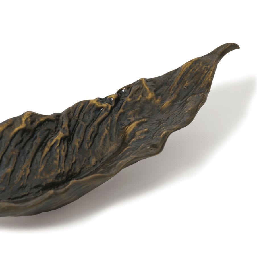 Dark bronze cast iron leaf-shaped bowl with raised organic texture, 13.5" wide.