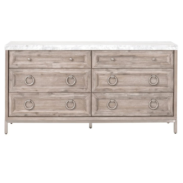 Natural gray wood dresser with white marble top, six drawers, and silver ring pulls.