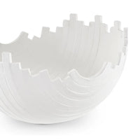 White sculpted metal Basalt decorative bowl with a plaster-like finish and unique textured, wavy design.