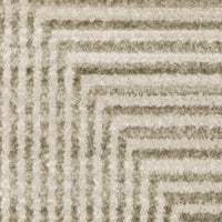 Close-up of Bauer Beige & Ivory Casual Rug, showing textured PET yarn with a geometric striped pattern.