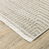 Bauer Beige & Ivory Casual Rug, made from recycled PET yarn, featuring a textured chevron pattern and fringe.