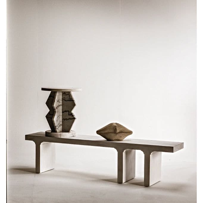 Belasco Round Geometric Marble Side Table with a solid marble top and a contemporary geometric base.
