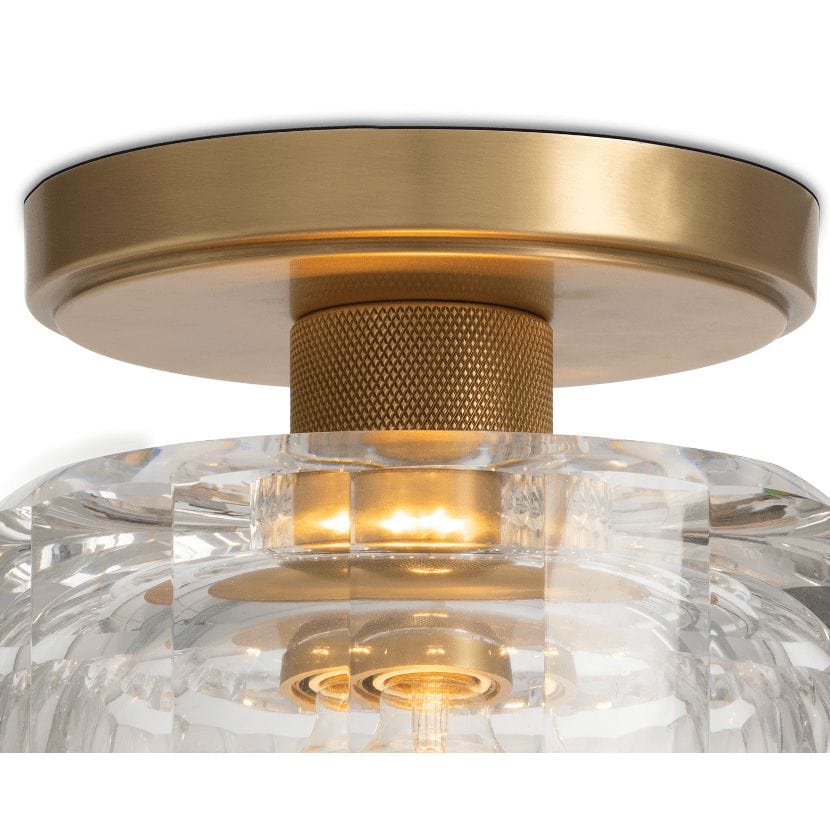 Bijoux Crystal Flush Mount with a clear, chunky cut crystal shade and a stout brass canopy.