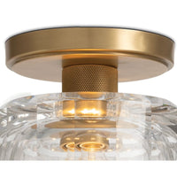 Bijoux Crystal Flush Mount with a clear, chunky cut crystal shade and a stout brass canopy.