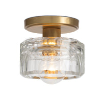 Bijoux Crystal Flush Mount with a clear, chunky cut crystal shade and a stout brass canopy.