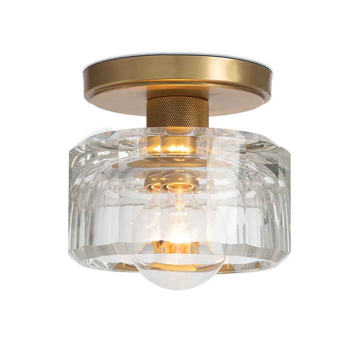 Bijoux Crystal Flush Mount with a clear, chunky cut crystal shade and a stout brass canopy.