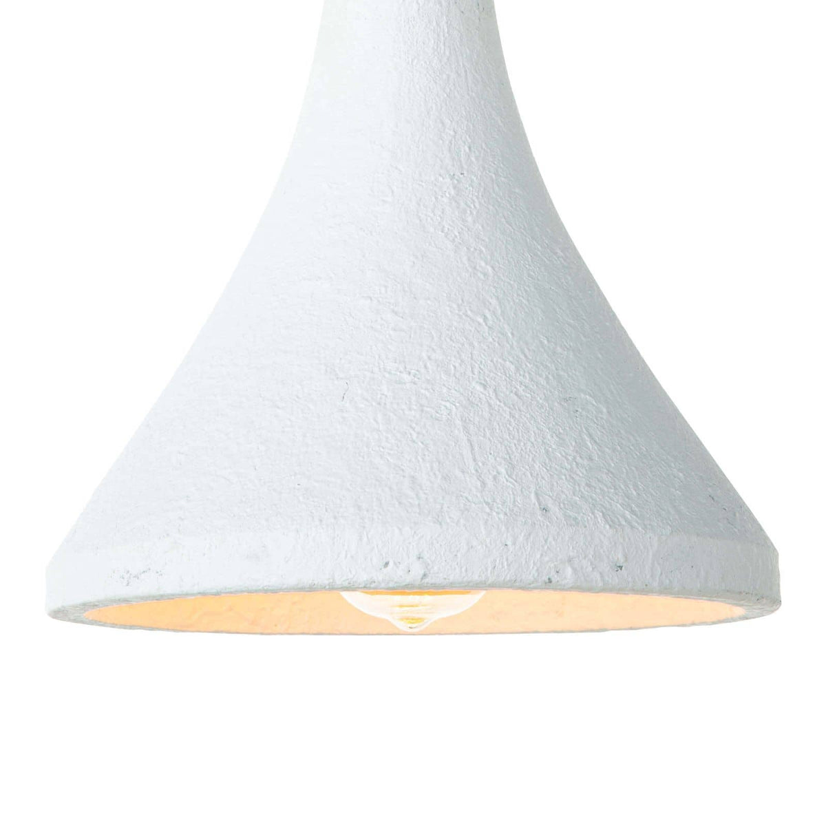 Small Billie concrete pendant light with a rough-hewn white bell-shaped shade and exposed bulb.
