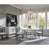 Large Bimini chandelier with natural woven seagrass, looped detailing, and nine linen shades.