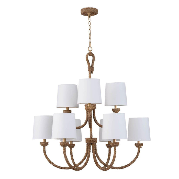 Large Bimini chandelier with natural woven seagrass, looped detailing, and nine white linen shades.