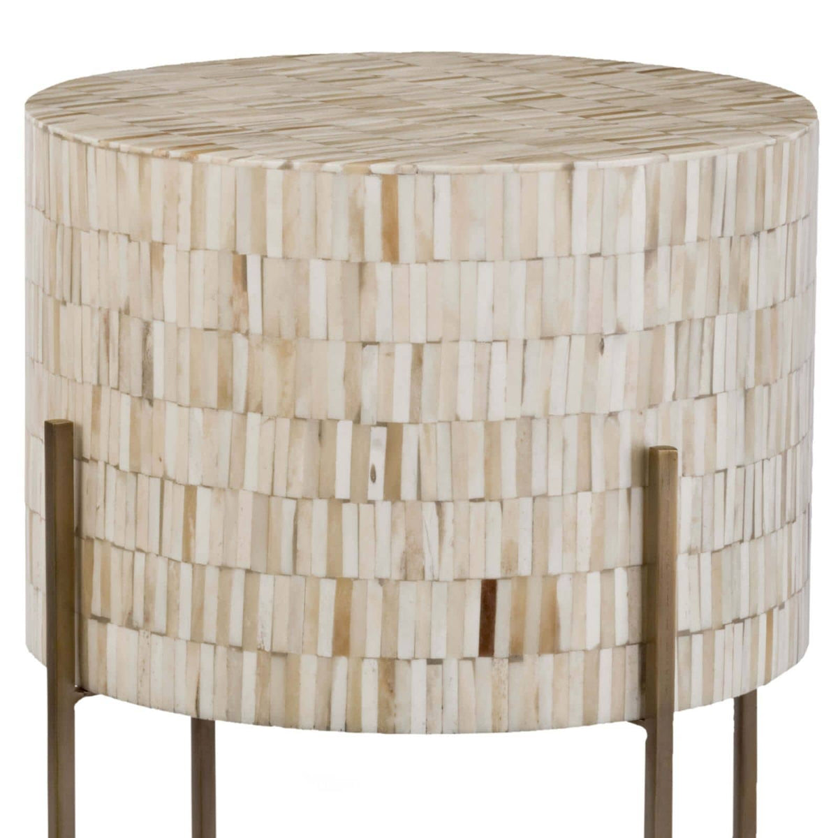 Round bone drum table with intricate inlay and antiqued brass legs.