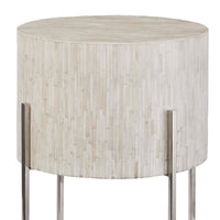 Bone Drum Table with intricate inlaid bone, soft shape, and polished nickel legs.