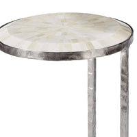 Round bone mosaic nesting table with a high-gloss top and polished nickel frame.
