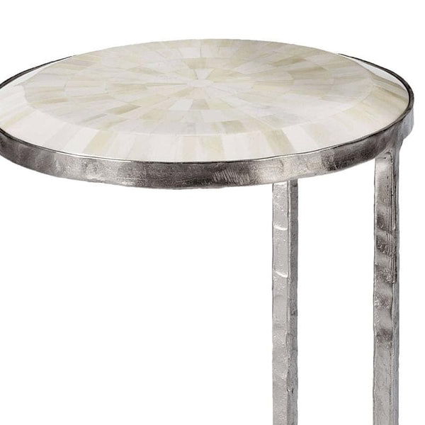 Round bone mosaic nesting table with a high-gloss top and polished nickel frame.