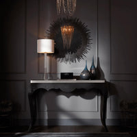 Borealis Graphite Mirror with delicate geometric iron strips in a modern bedroom setting.