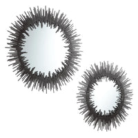 Two Borealis Graphite Mirrors with geometric iron strips forming a unique sunburst design.