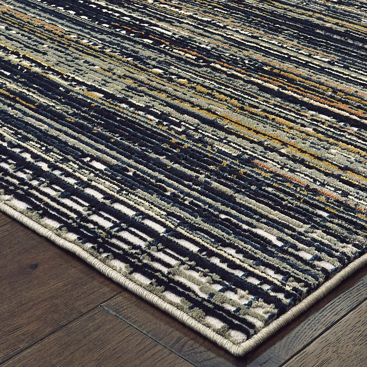 Bowen Black Multi-Colored Abstract Rug with high/low textured design, polypropylene and polyester blend.