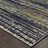Bowen Black Multi-Colored Abstract Rug with high/low textured design, polypropylene and polyester blend.