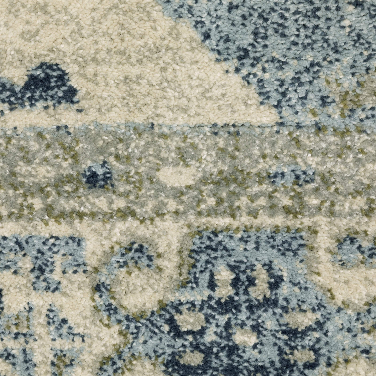 Close-up of a Branson Blue & Beige Traditional Rug with soft polypropylene fibers and abstract patterns.
