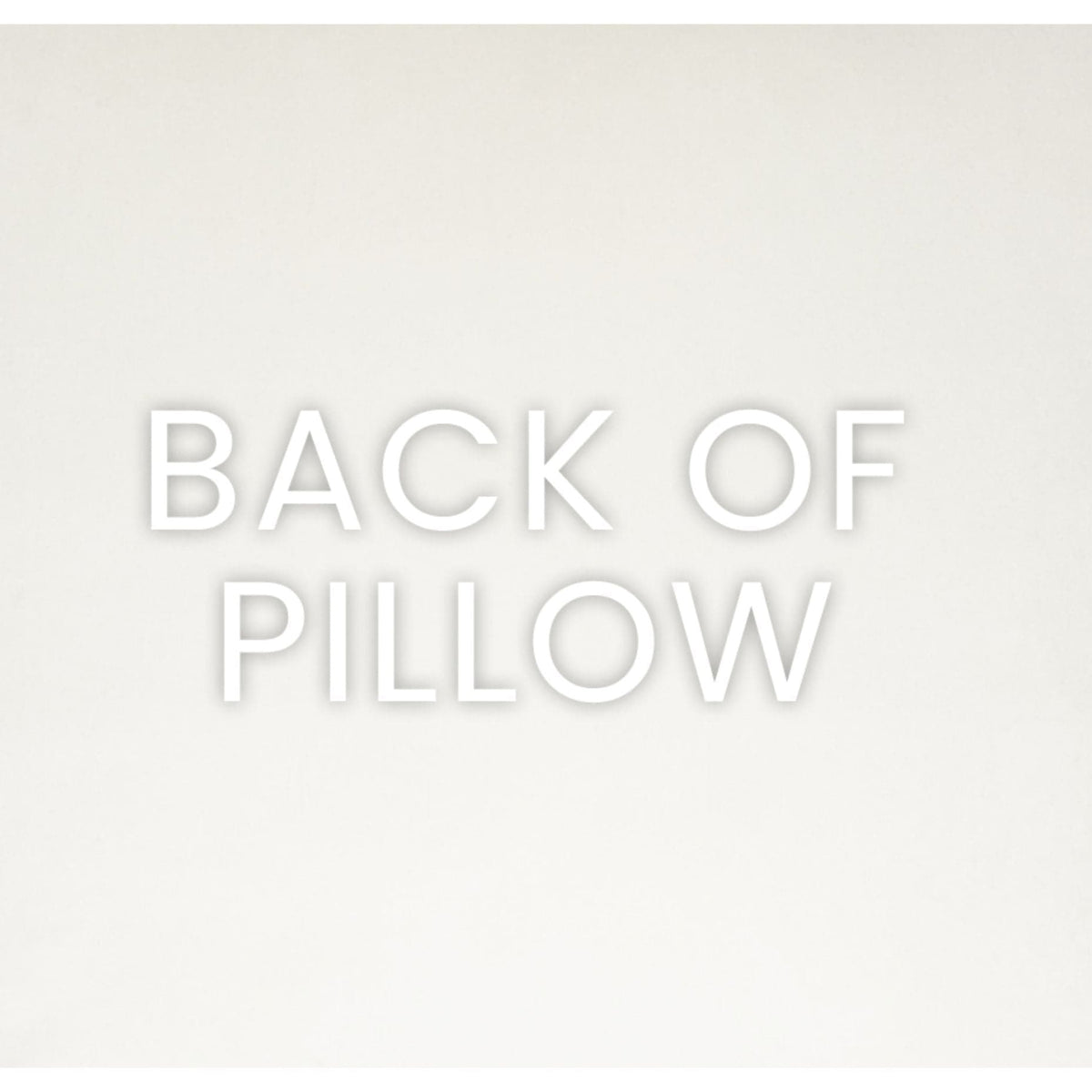 Back of a Brix Sapphire Throw Pillow, showing the solid polyester fabric.