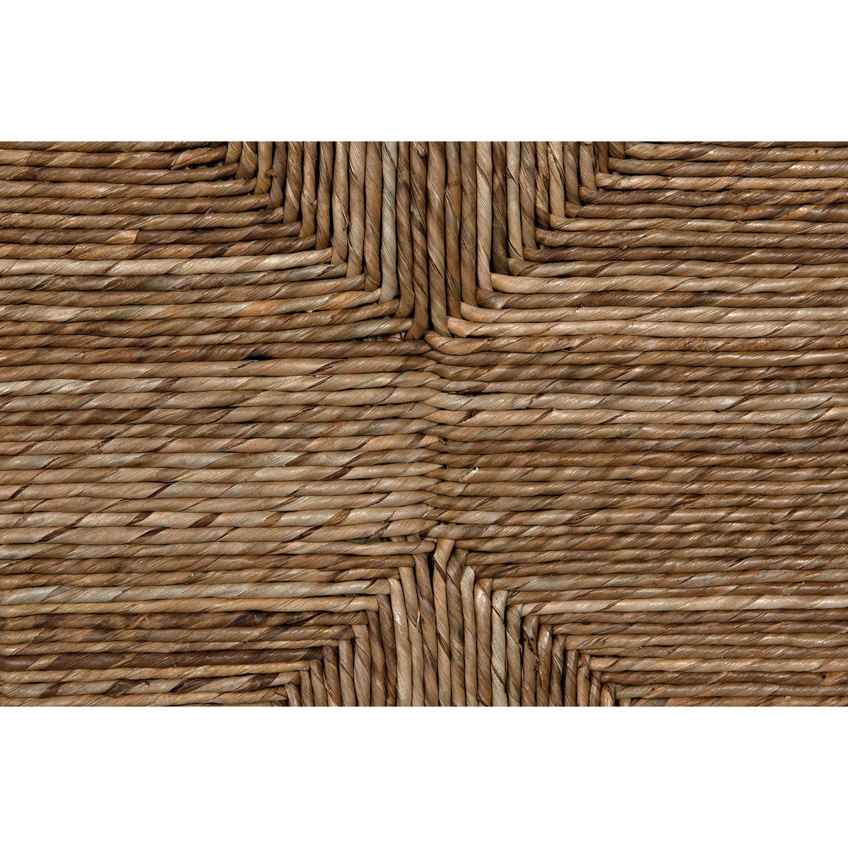 Close-up of natural sea grass weaving with a cross pattern, showing texture and warm brown tones.