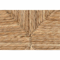 Close-up of natural sea grass weaving, showing horizontal and vertical patterns.