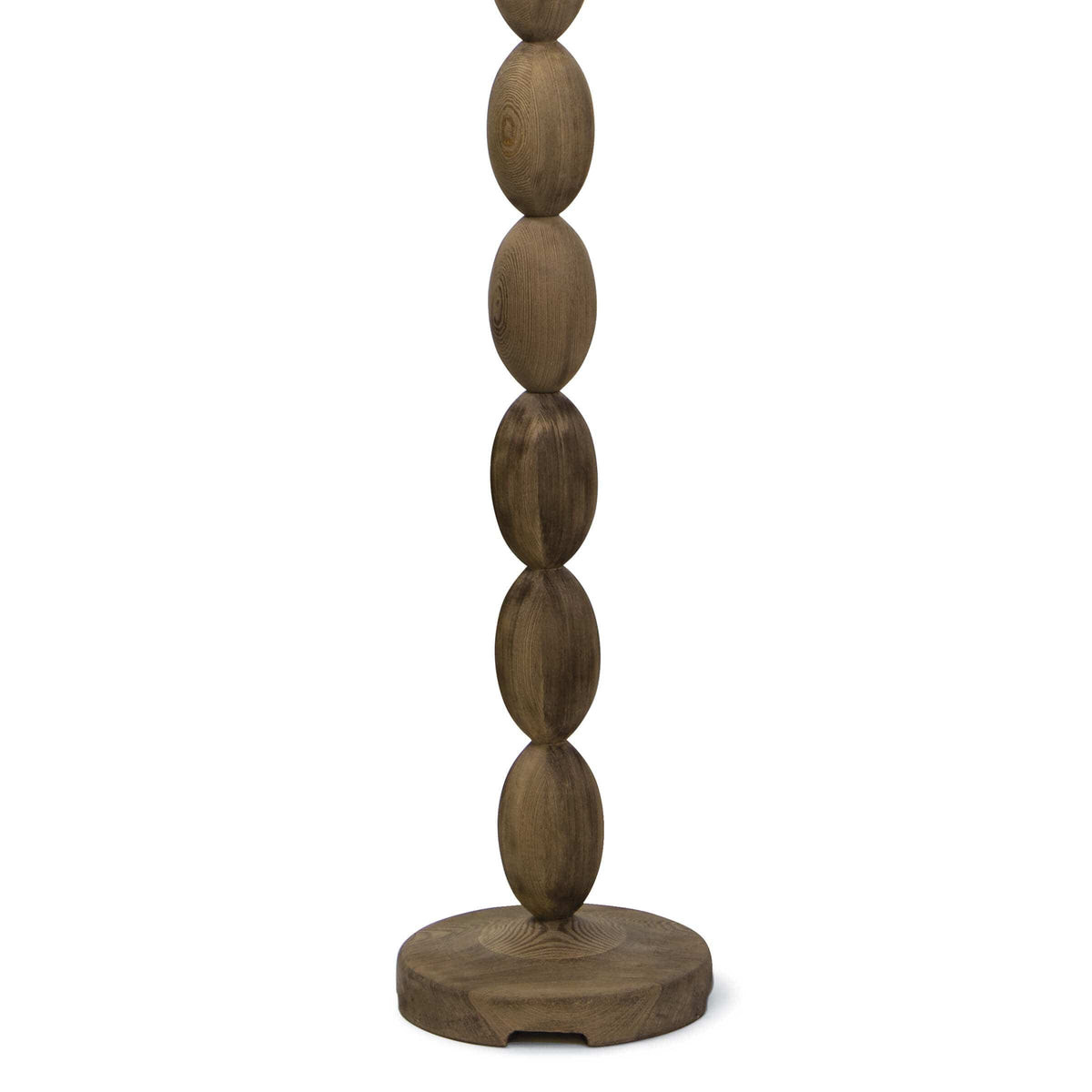 Buoy floor lamp with a stacked birch wood base and a natural linen drum shade, featuring polished brass hardware.