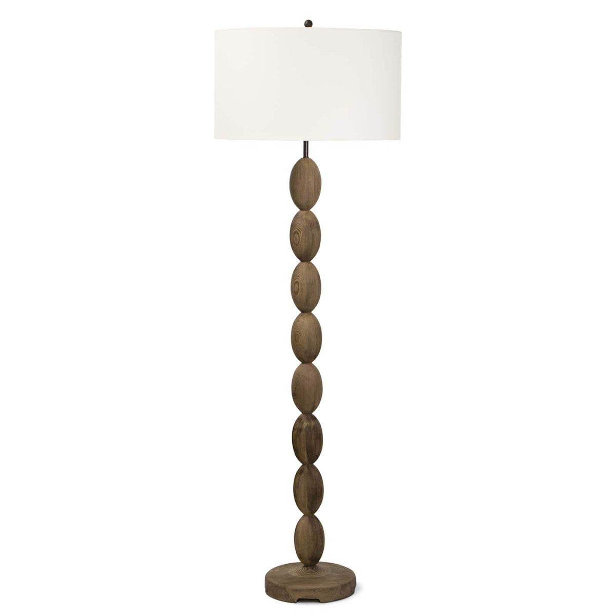 Buoy floor lamp with a birch wood base featuring stacked oval shapes and a white linen drum shade.