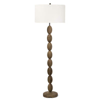 Buoy floor lamp with a birch wood base featuring stacked oval shapes and a white linen drum shade.