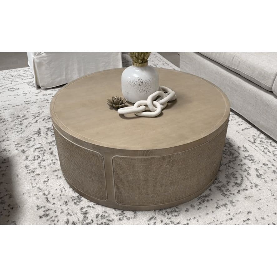 Round Callie Gray Cane Coffee Table with smoke gray oak top and cane inlay sides.