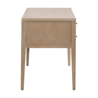 Callie Gray Cane Desk, a bohemian oak wood writing desk with smoke gray tones and cane inlay drawers.
