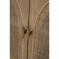 Close-up of Callie Gray Cane Media Cabinet doors with smoke gray oak and cane, featuring brass handles.