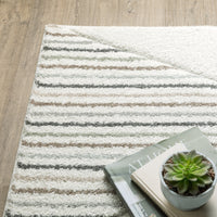 Cambria Beige & Multi Casual Rug with textured stripes, soft polypropylene, and carved high-pile design.