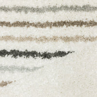 Cambria Beige & Multi Casual Rug, close-up of soft polypropylene with textured beige, gray, and pale blue stripes.