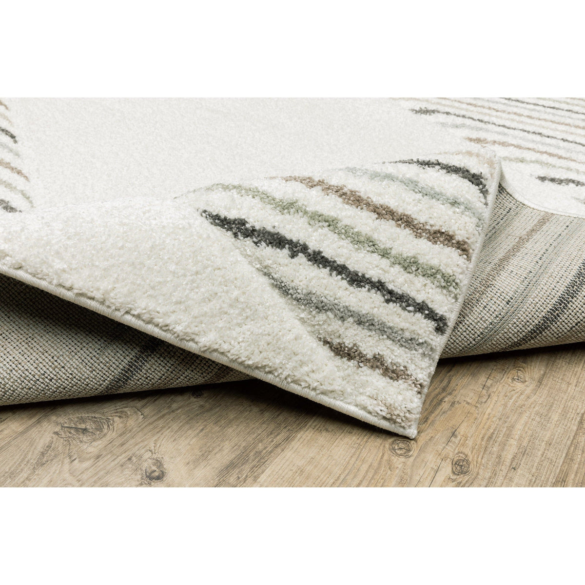 Cambria Beige & Multi Casual Rug, power-loomed polypropylene, with carved texture and subtle stripes.