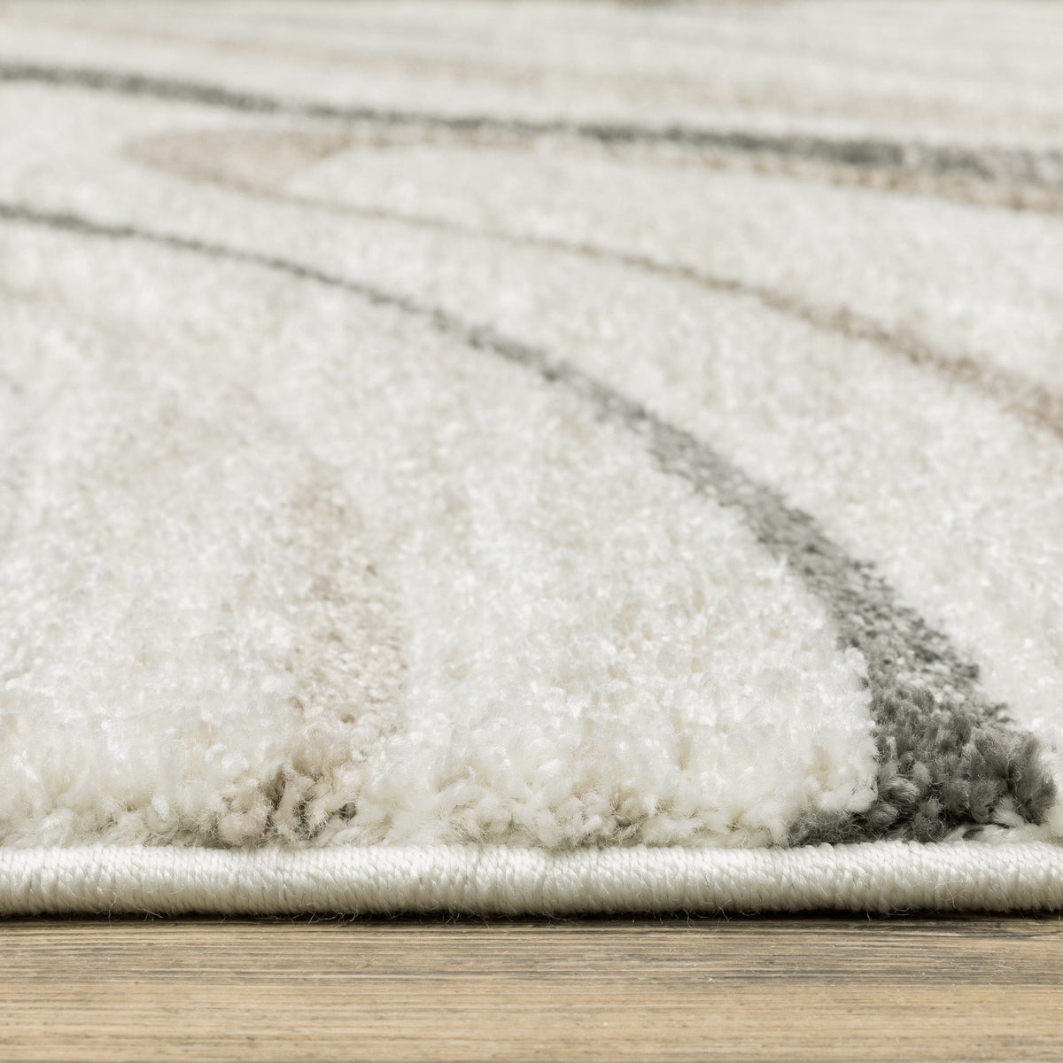 Cambria Beige Multi-Colored Contemporary Rug with soft polypropylene fibers and abstract neutral tones.