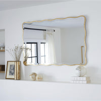 Candice Gold Leaf Rectangle Mirror with an undulating gilded frame and beveled edge, 44x28 inches.